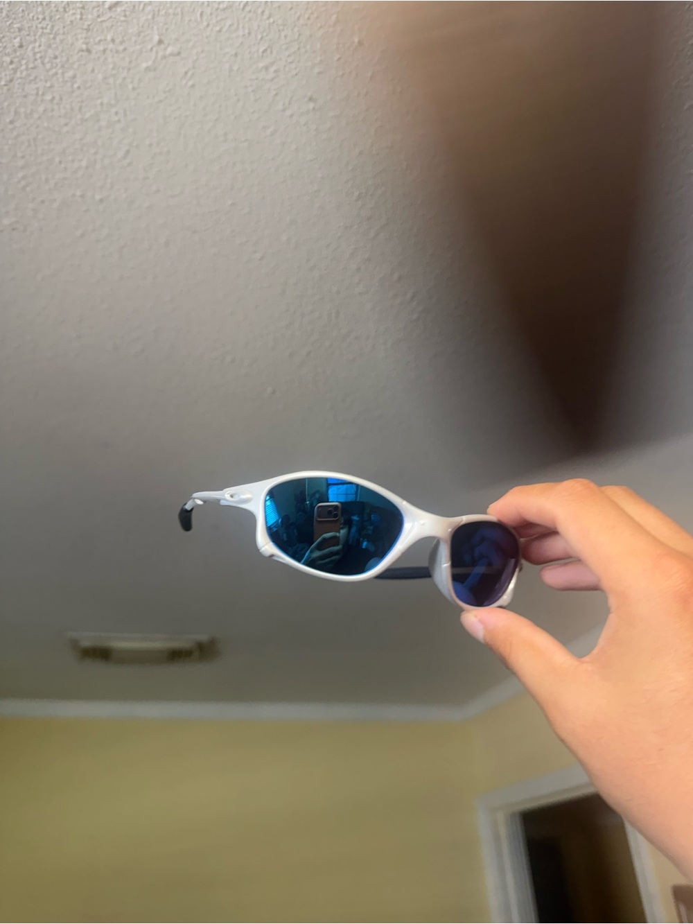 White Frame Sunglasses with Blue Mirrored Lenses Oakley Oakley’s